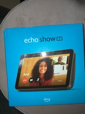Amazon Echo Show 8 — Bright Blue Packaging with Black Device Image